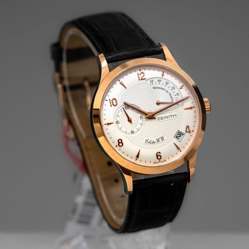 ZENITH - Elite HW oro rosa 18k con riserva di carica, datario e secondi al  nove. Accompagnato da scatola originale e garanzia NOS - Asta Orologi da  Polso e da Tasca -