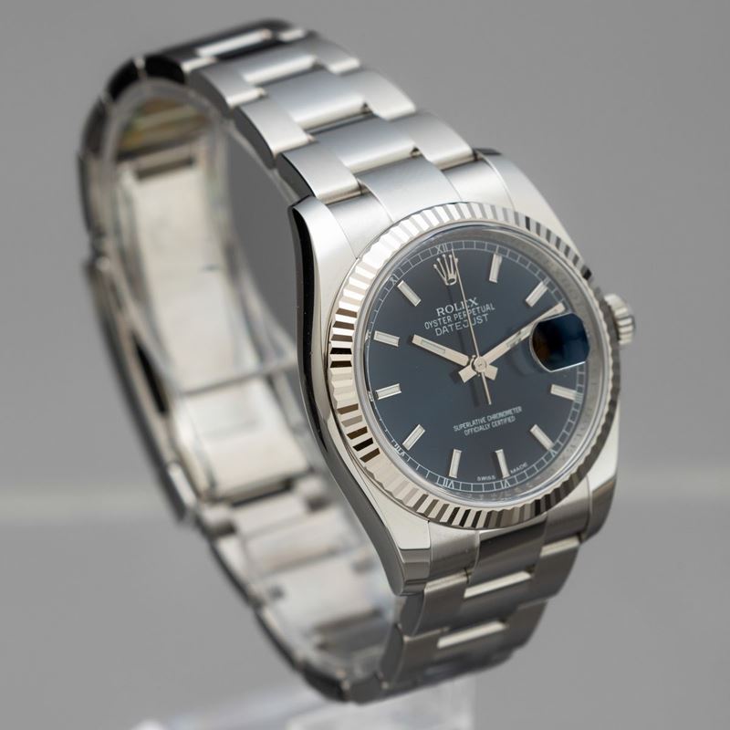 ROLEX - Datejust 36 mm, ref 116234 in acciaio con ghiera zigrinata in oro  bianco, quadrante blu Soleil e datario “Roulette” - Asta Orologi da Polso e  da Tasca - Cambi Casa d'Aste