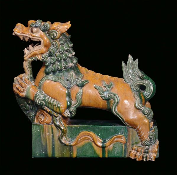 A large glazed stoneware tile representing a Pho dog, China, Ming Dynasty, 17th century