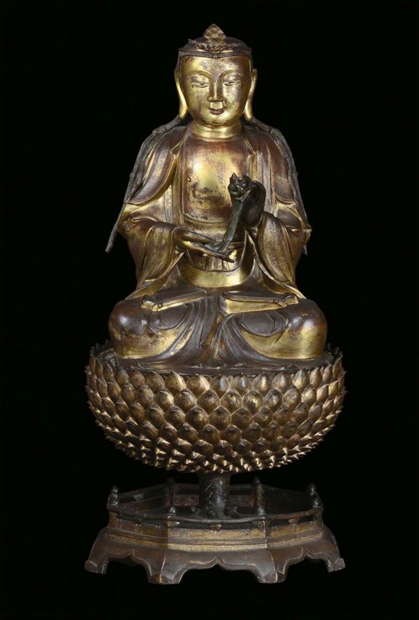 A large and important gilt bronze figure of Buddha on a lotus flower, China, Ming Dynasty, 17th centu [..]