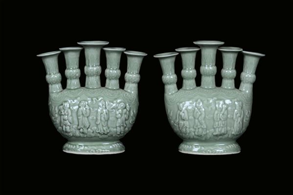 A pair of Celadon porcelain vases, China, Qing Dynasty, 19th centuryDecorated with relief figures