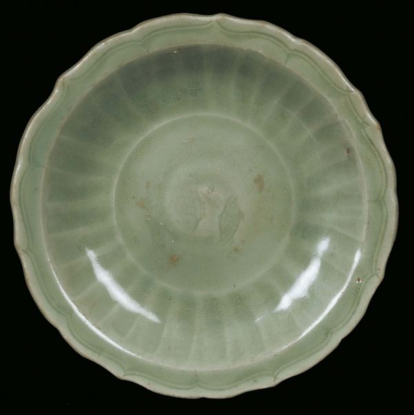 A Longquan Celadon porcelain plate with fishes, China, Yuan Dynasty (1279-1368)
