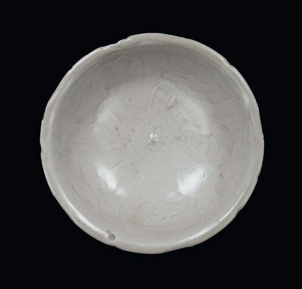 An earthenware qingbai bowl with engraved designs, China, Song Dynasty  (960-1279)