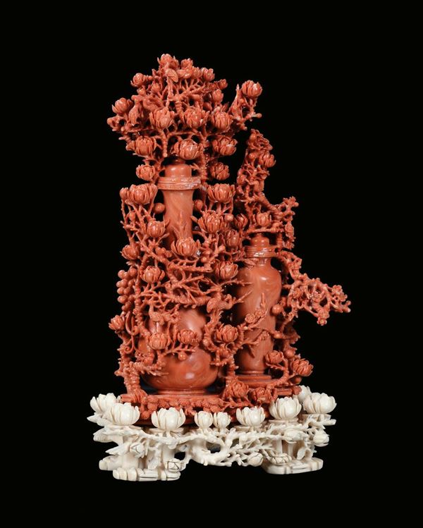 A carved red coral with vases and flowers, China, Qing Dynasty, late 19th century