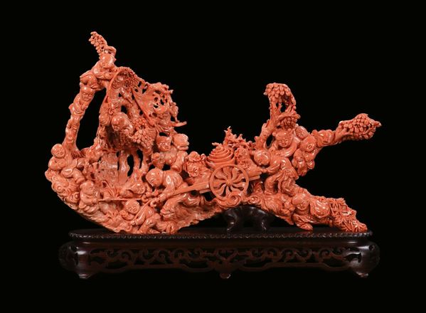 A carved coral with figures and cart, China, early 20th century
