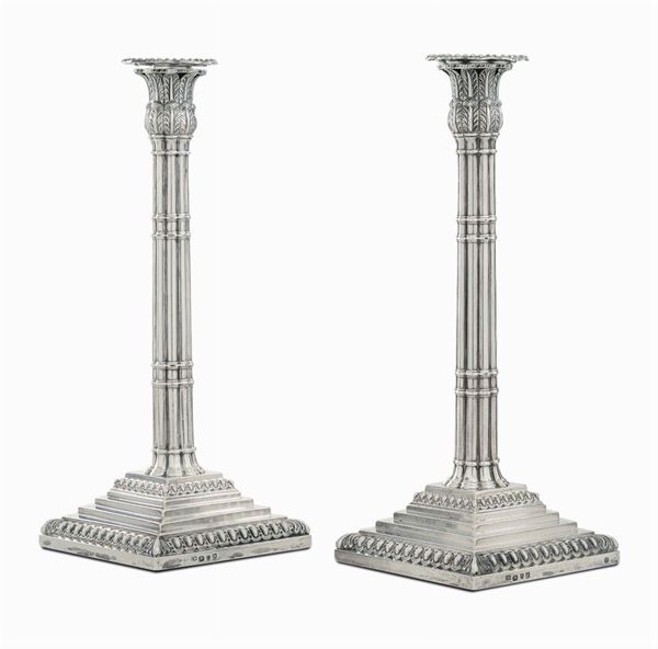 A pair of silver candlesticks, London 1870, silversmith IW