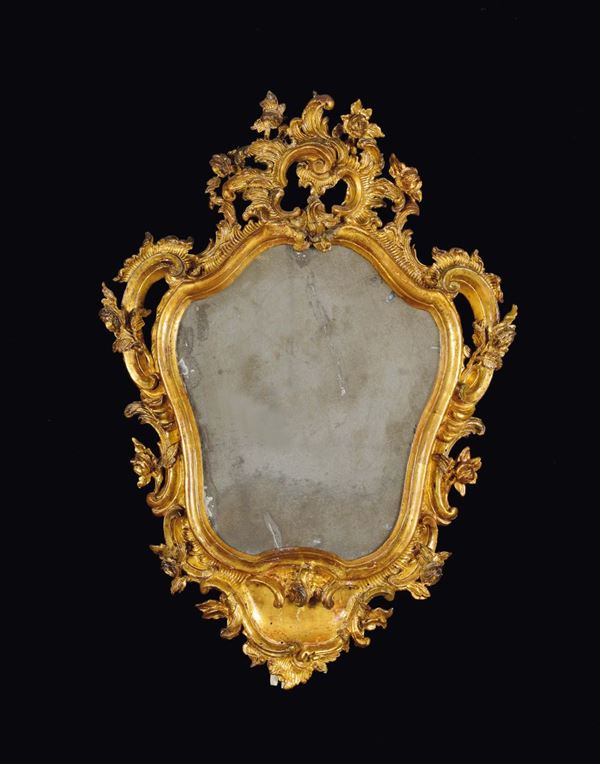 Piccola specchiera sagomata Luigi XV in legno intagliato e dorato, Genova, metà XVIII secolo