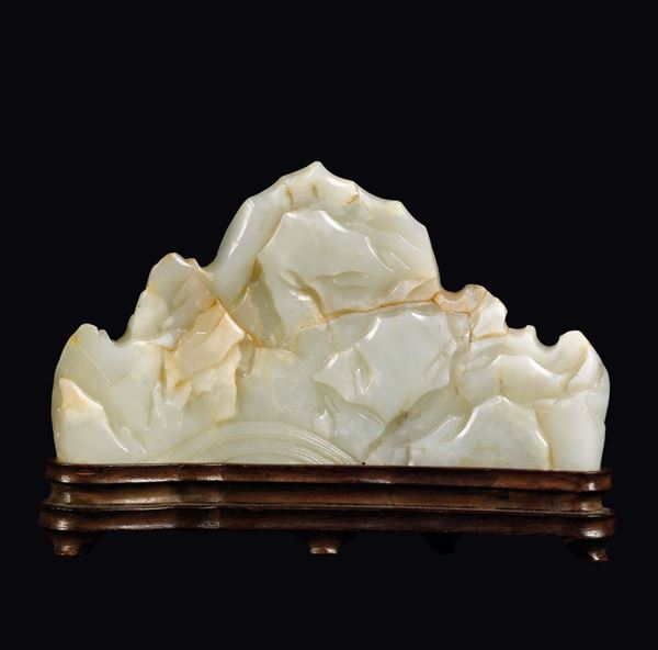 A white and russet jade mountain brushpot, China, Qing Dynasty, Qianlong Period (1736-1795)