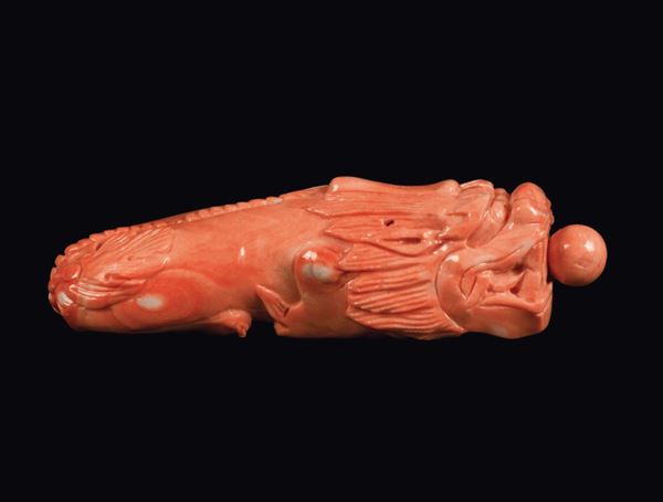 A carved coral snuff bottle shaped as a lion, China, Qing Dynasty, 19th century