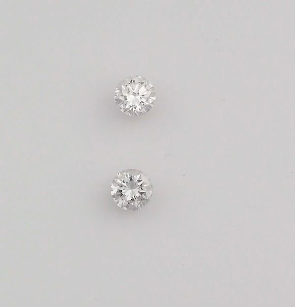 Due diamanti taglio rotondo a brillante ct 2,06 ciascuno