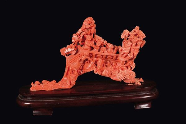 A carved coral bridge with children group, China, early 20th century