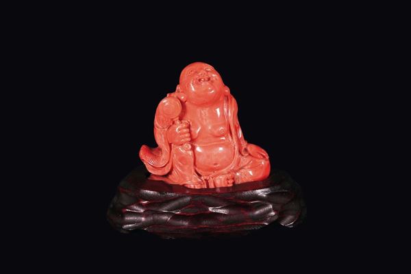 A carved coral figure of Budai, China, Qing, Dynasty, late 19th century