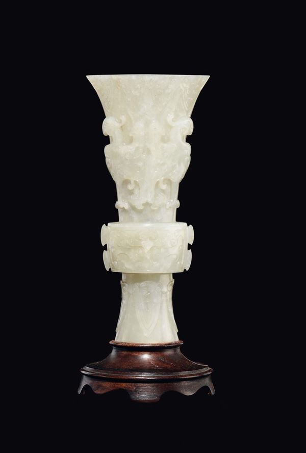 A white jade vase with archaistic decoration in relief, China, Qing Dynasty, Qianlong Period (1736-1795)