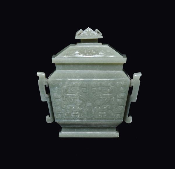 A Celadon white jade vase and cover with a geometric archaic style motif, China, Qing Dynasty, Qianlong Period (1736-1795)