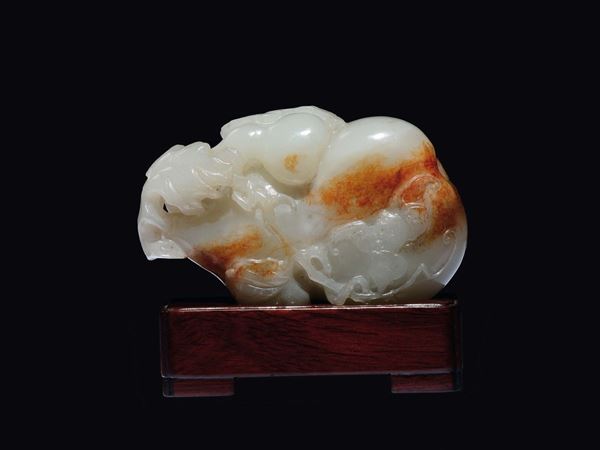 A white and russet jade pumpkin with leaves group, China, Qing Dynasty, Qianlong Period (1736-1795)
