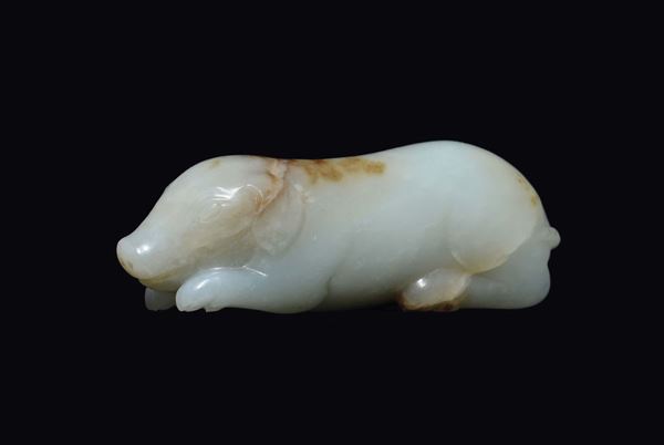A white and russet jade carving of a small pig, China, 20th century