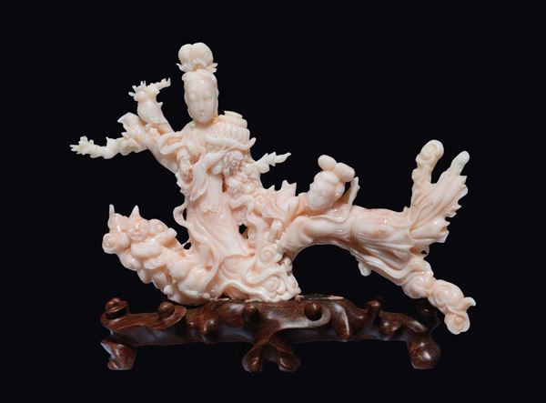 A lot of three carved coral groups with Guanyin, China, early 20th century