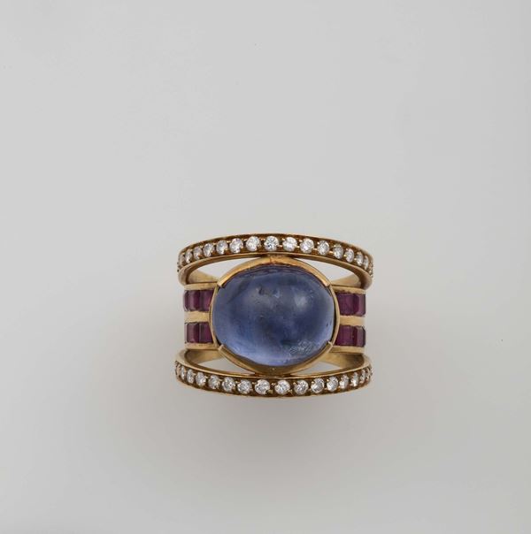 Cabochon-cut sapphire, diamond and ruby ring
