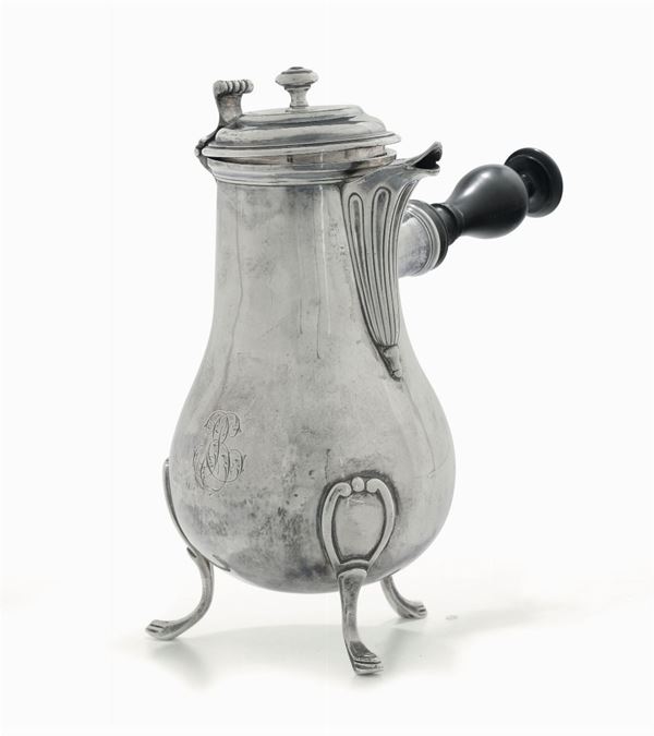 A coffee-pot in molten, embossed and chiselled silver, Paris, 1768-1774, silversmith I.G. with a crown