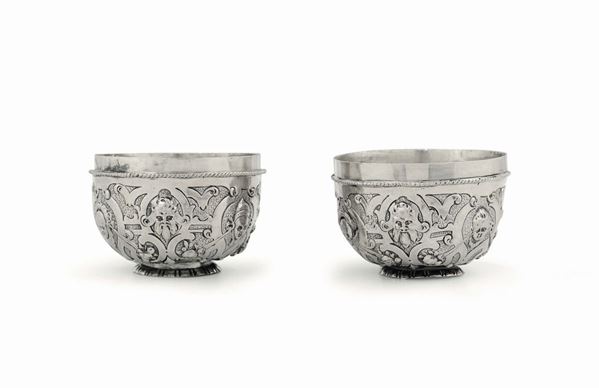 Two cups in embossed and chiselled silver, silversmith RC with a crown, Ausburg 16th-17th (?) century