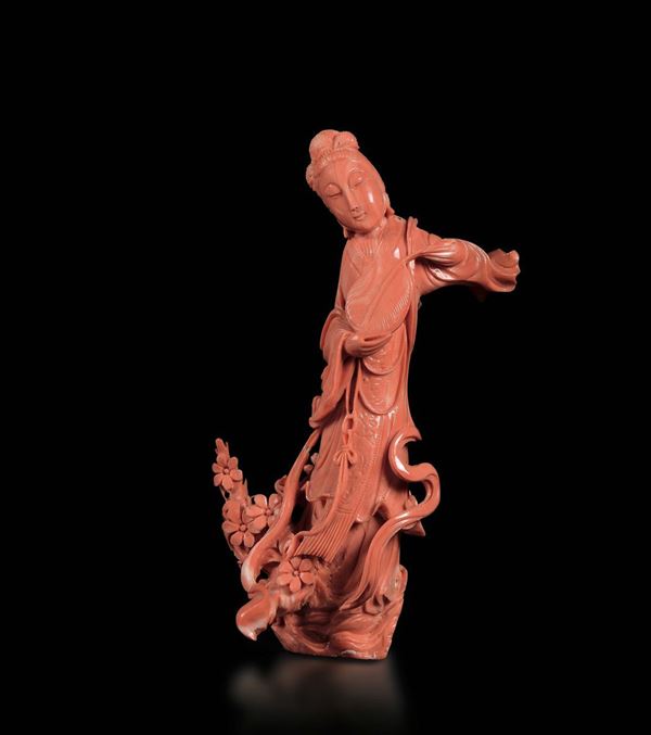 A small carved coral figure of playing Guanyin, China, early 20th century