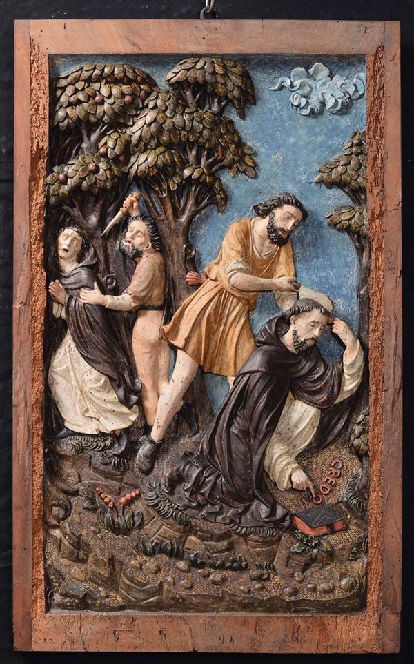 A carved wooden polychrome panel with the martyr of St. Peter, attributed to Giovanni-Pietro and Giovanni-Ambrogio De Donati, 16th century