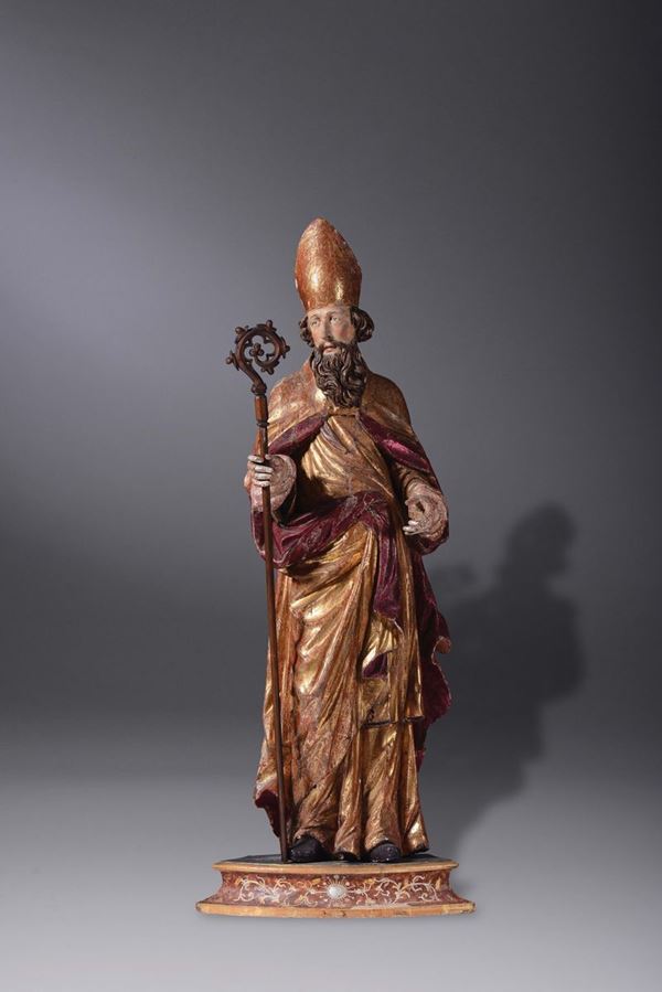 A golden and wooden polychrome sculpture with Saint Bishop, 17th century Austrian or Tyrolese artisan, height cm 126