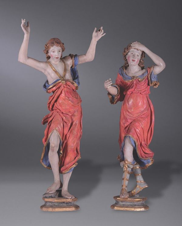 A pair of wooden sculptures with 2 figures, 17th century Austrian or German sculptor, height cm 168 and 152