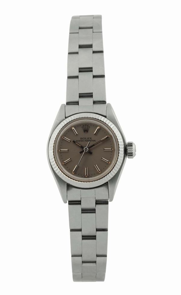 ROLEX, Oyster Perpetual, case No.3617651, Ref. 6719, center seconds, self-winding, water-resistant, stainless steel and 18K white gold lady's wristwatch with a stainless steel Rolex Oyster bracelet and deployant clasp. Accompanied by the original box. Made in 1974