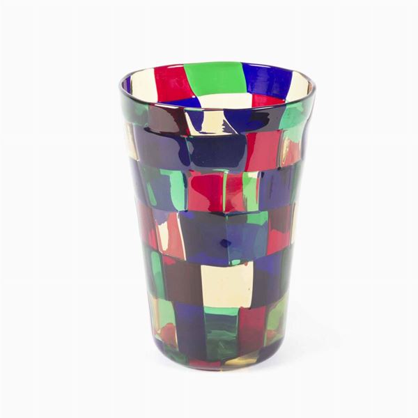 Venini, Fulvio Bianconi, 1980 ca. A cilindrical blown glass vase “Pezzato Parigi” series with a decor of multicolored tiles