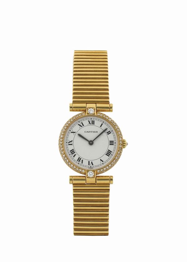 CARTIER, orologio da polso, da donna, al quarzo, in oro giallo 18K e brillanti con bracciale in oro Cartier. Realizzato circa nel 1990