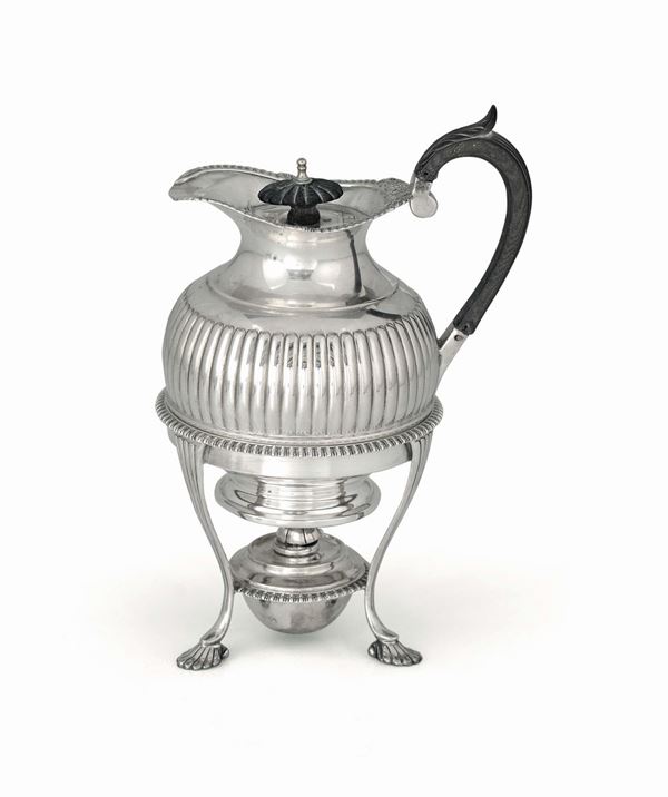 A teapot with burner in Sterling silver, London (marks different from 1898-1899), end of the 19th century, silversmith G. & S. C°