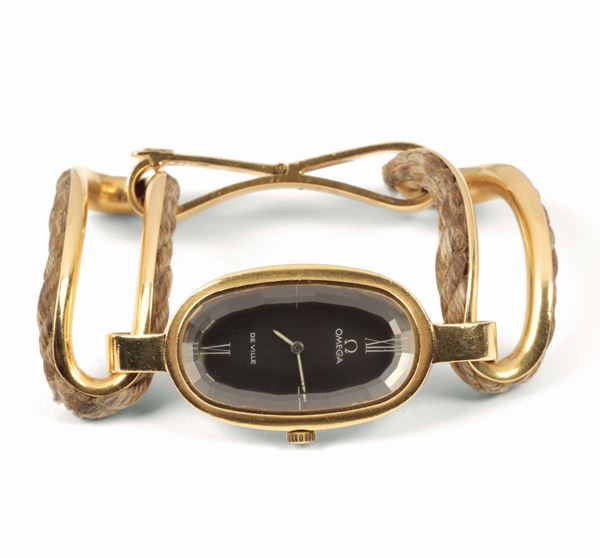 OMEGA, DE VILLE, per Scavia, orologio da polso, in oro giallo 18K con bracciale in oro. Realizzato circa nel 1970 circa