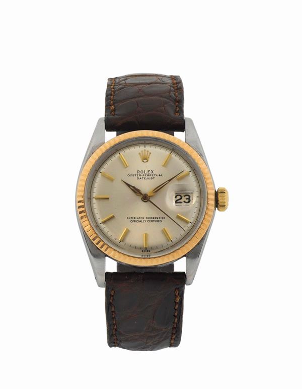 ROLEX, Oyster Perpetual Datejust, Superlative Chronometer, Officially Certified, case No. 1003054 , Ref. 1601. center seconds, self-winding, water-resistant, stainless steel and pink  gold  wristwatch with date and a stainless steel Rolex buckle. Made circa 1960