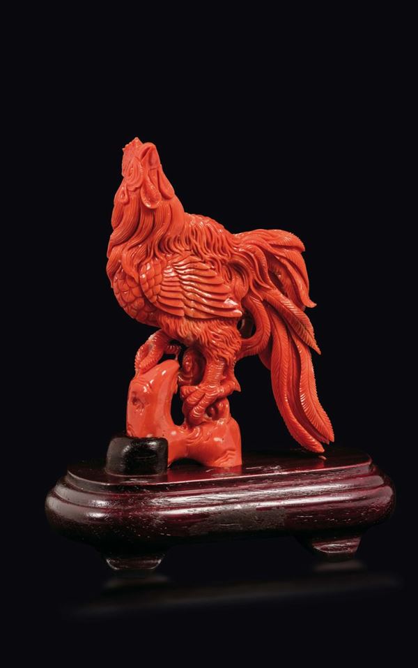 A carved coral figure of rooster on a rock, China, early 20th century