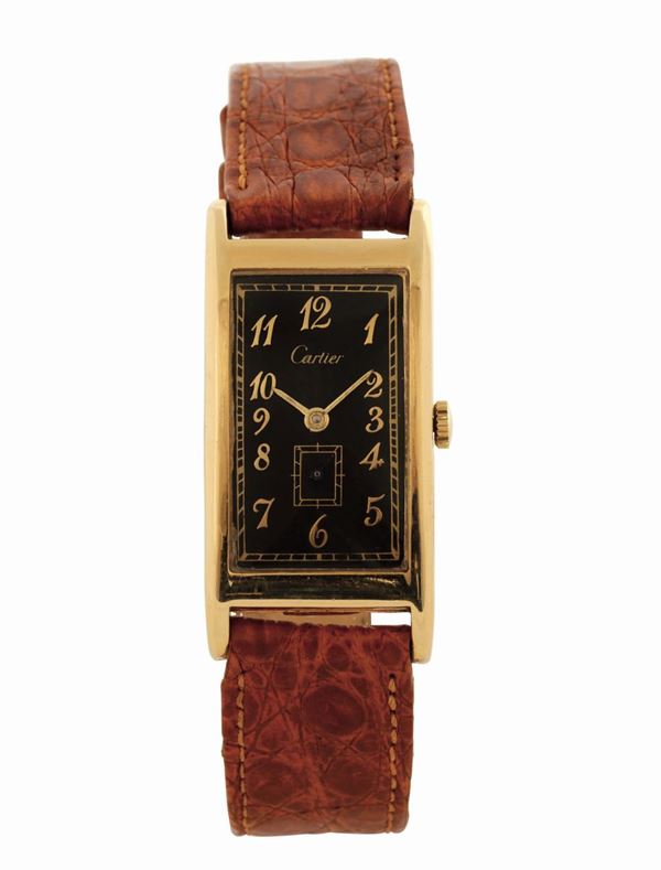 CARTIER, for Movado, cassa No. 43898, orologio da polso, in oro giallo 14K, di forma rettangolare con fibbia placcata oro. Realizzato nel 1940 circa