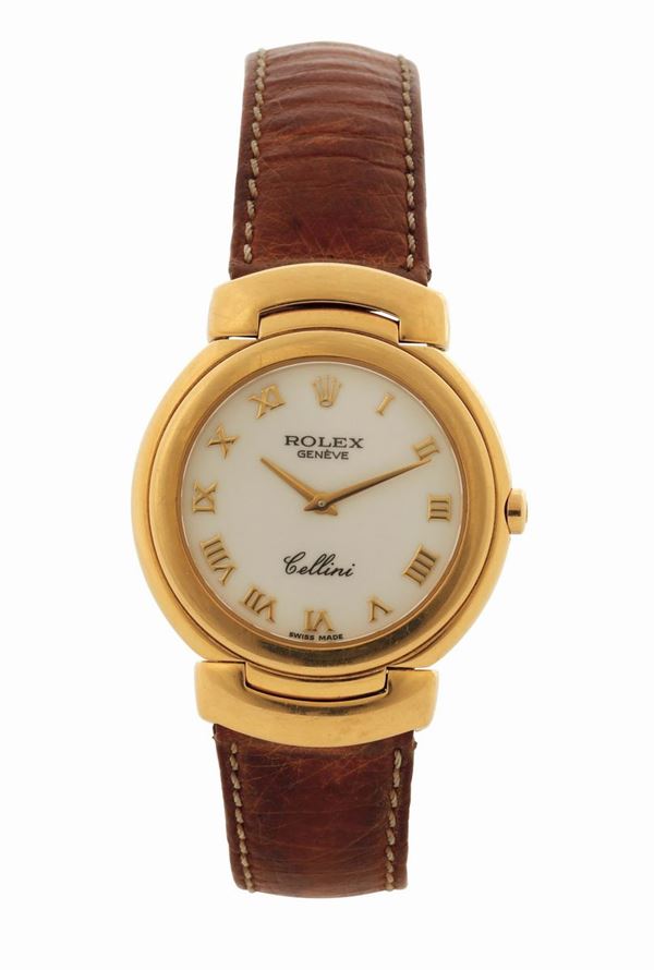 ROLEX, CELLINI, YELLOW GOLD QUARTZ . Made in the early 1990s. Fine, 18K yellow gold quartz wristwatch with a gold Rolex  concealed deployant clasp.