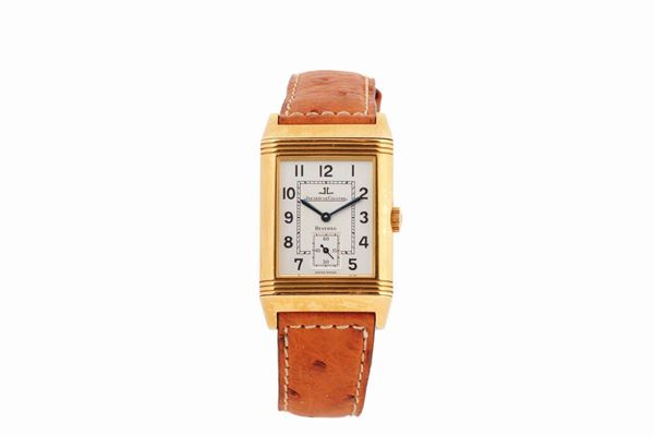 JAEGER-LECOULTRE, GRAND TAILLE,  REF. 270.1.62.  Made circa 1990. Fine and rare, rectangular and reversible, 18K yellow gold wristwatch with an 18K yellow gold Jaeger- LeCoultre buckle.  Accompanied by the original box and Guarantee