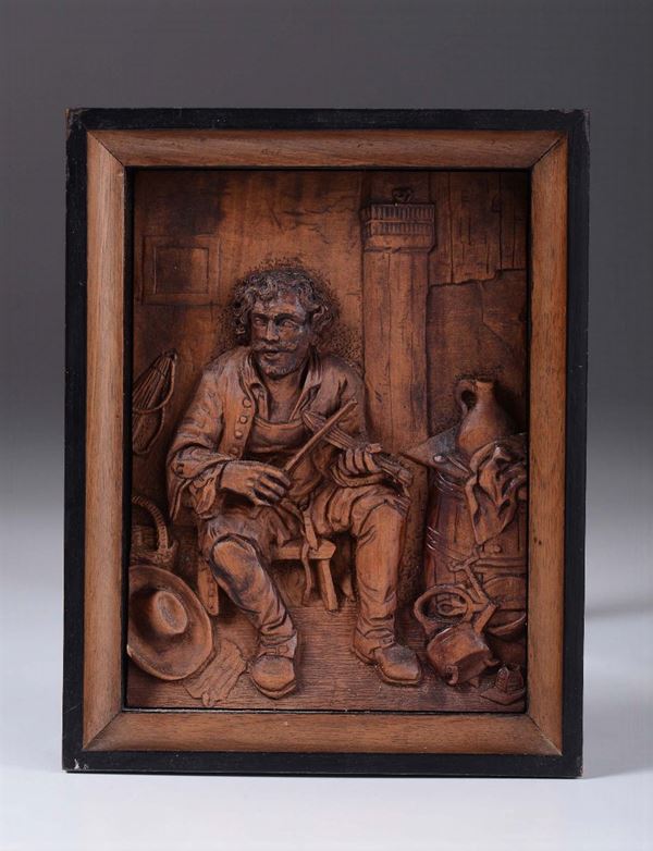 A wooden relief with a musician, Germany or Austria, 19th century