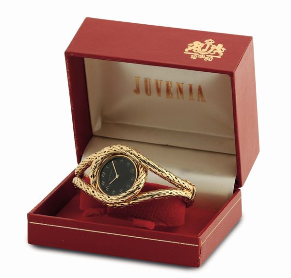 JUVENIA, case No. 1196261, 18K yellow gold, lady's wristwatch with gold snake bracelet. Made circa 1960. Accompanied by the original box and Guarantee