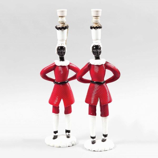 Fulvio Bianconi, Venini, Murano, 1948 ca. A pair of figurines in red glass, milk glass and black glass, depicting Mori holding candles.