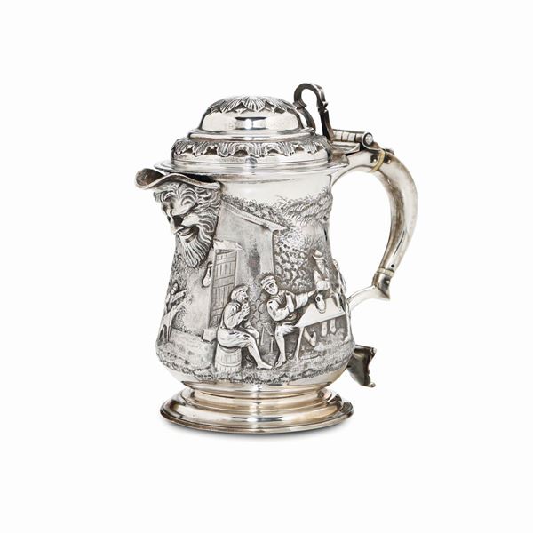 A tankard in molten, embossed and chiselled silver, London 1747, silversmith John Wirgman