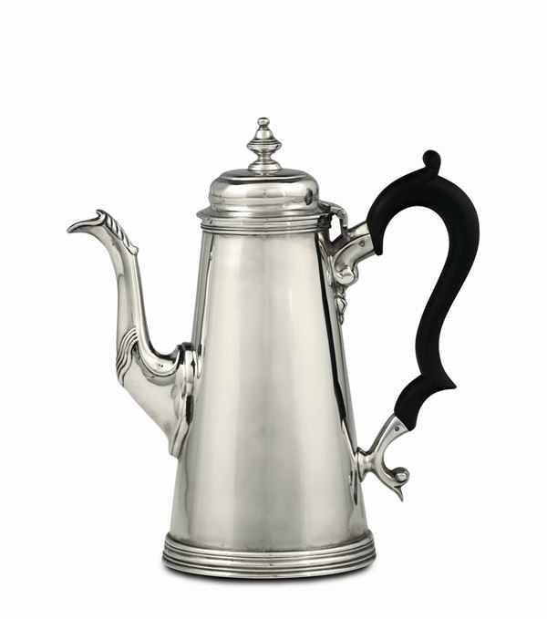 A coffee pot in molten, embossed and chiselled silver, 1891, marks for the city of Sheffield and for the silversmith Henry Stratford