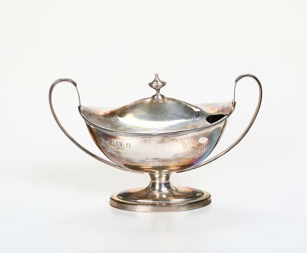 A sauce boat in molten, embossed and engraved silver, two-handled body, Birmingham 1901