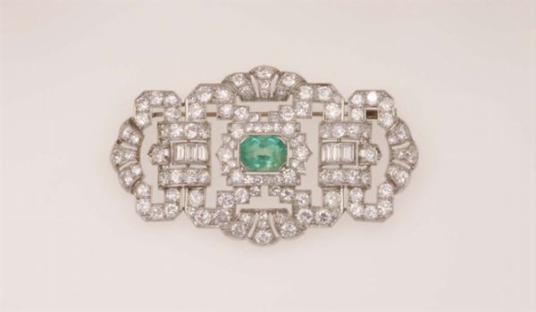 Emerald, diamond and platinum brooch. Montano