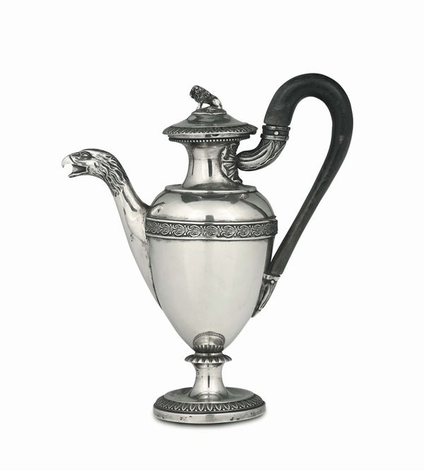 A coffee pot in embossed and chiselled silver, Florence, 19th century, Florentine marzocco.