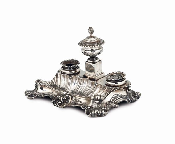An inkstand in molten, embossed and chiselled silver, Turin, half of the 19th century, guarantee marks from the Uffici del Marchio (Mauritian cross and bull's head).