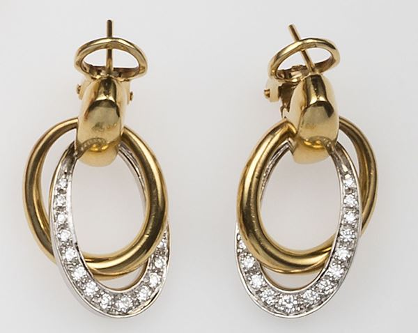 Pair of gold and diamond pendent earrings