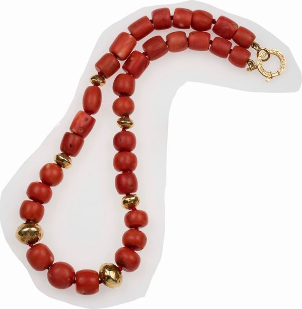 Graduated coral beads and gold necklace