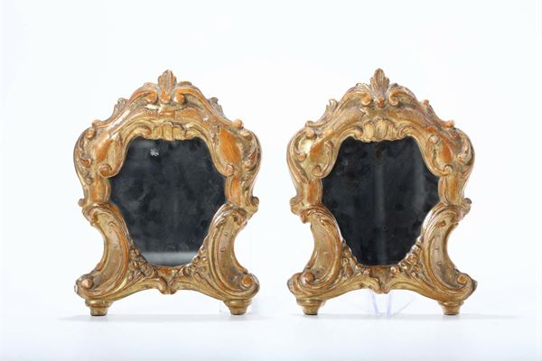 Coppia di specchiere in legno intagliato e dorato, Bologna XVIII-XIX secolo
